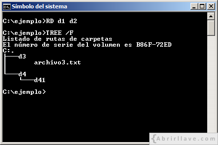Ventana del Símbolo del sistema ejecutando el comando RD para eliminar dos directorios vacíos - Ejemplo del tutorial de CMD de {Abrirllave.com