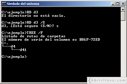 Ventana del Símbolo del sistema ejecutando el comando RD para eliminar un directio que no está vacío - Ejemplo del tutorial de CMD de {Abrirllave.com