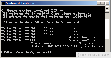 Ventana del Símbolo del sistema en Windows donde se muestra cómo utilizar el comodín asterico con DIR - Ejemplo del tutorial de CMD de {Abrirllave.com