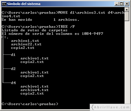 Ventana del Símbolo del sistema en Windows donde se muestra cómo se puede mover un archivo a un directorio y renombrarlo usando el comando MOVE - Ejemplo del tutorial de CMD de {Abrirllave.com