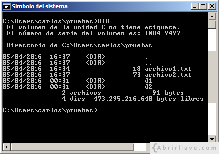 Ventana del Símbolo del sistema en Windows donde se muestra archivo1.txt y archivo2.txt con el comando DIR - Ejemplo del tutorial de CMD de {Abrirllave.com